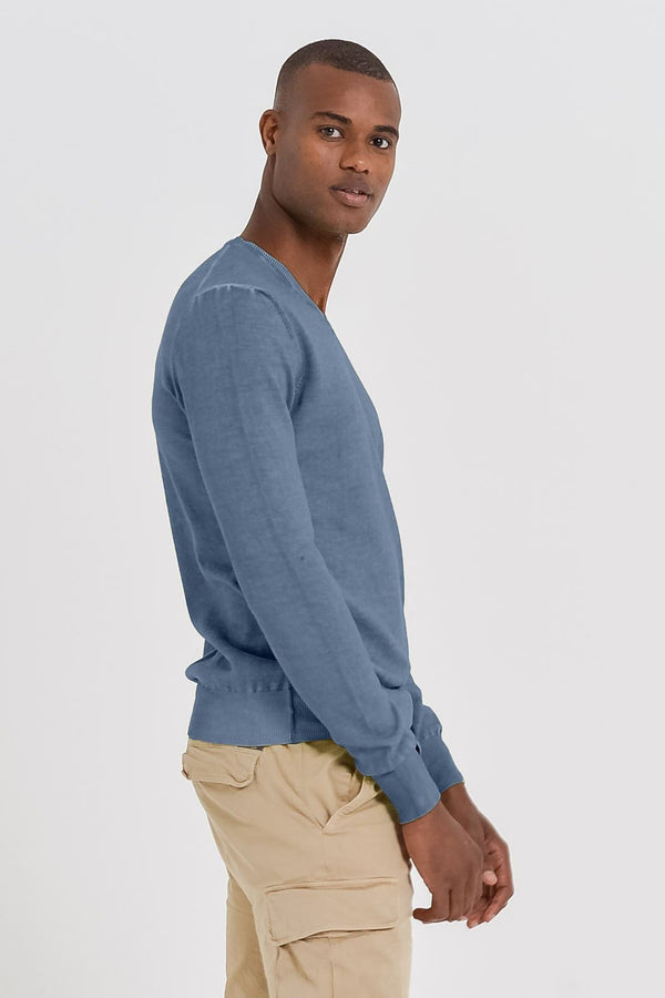 blue sweater and jeans